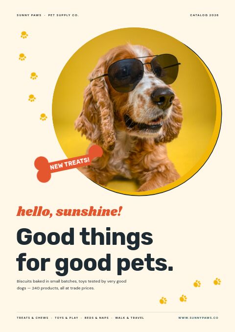 Pet treat catalog cover: a spaniel in sunglasses inside a yellow circle, a NEW TREATS bone banner and paw prints